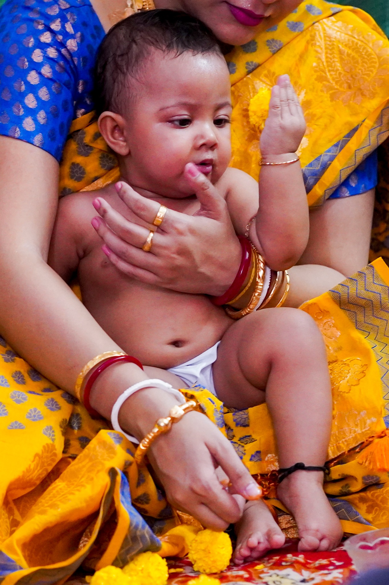 Rice ceremony baby cute pose