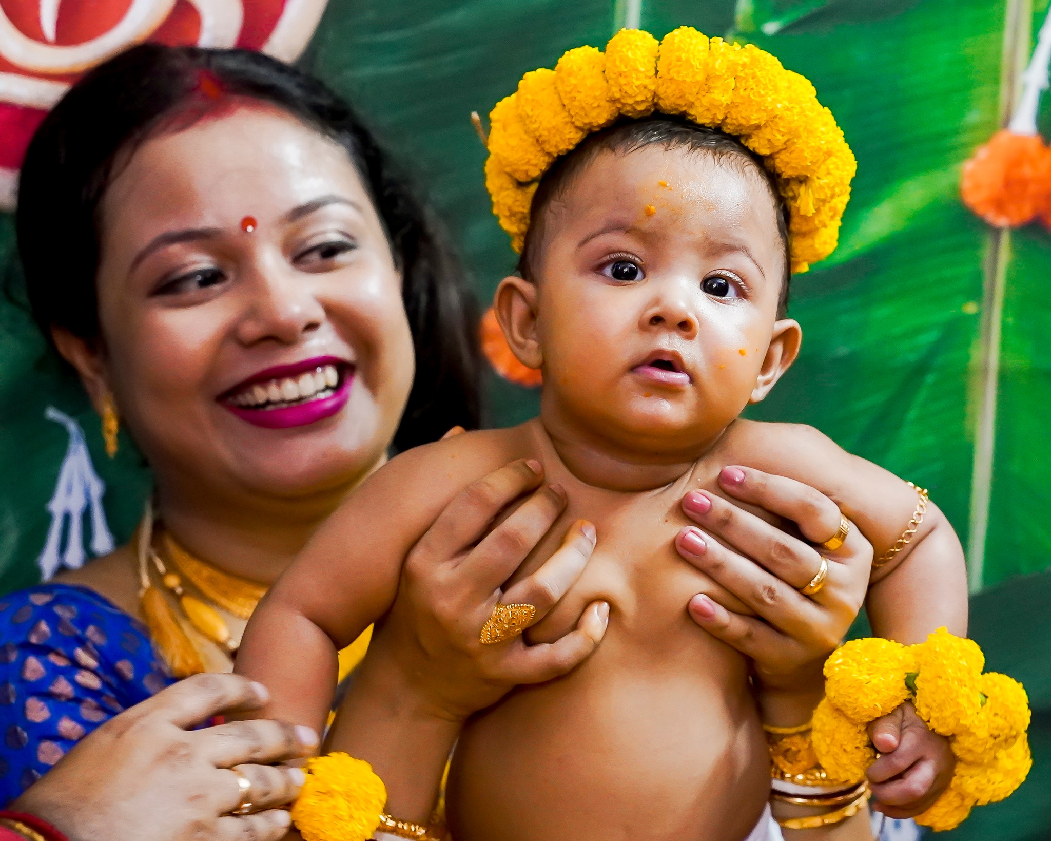Rice ceremony baby pose