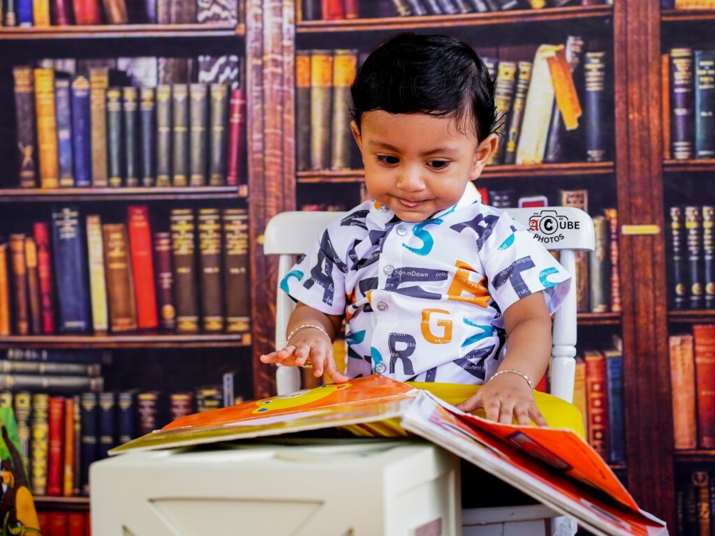 bookworm baby funny pose