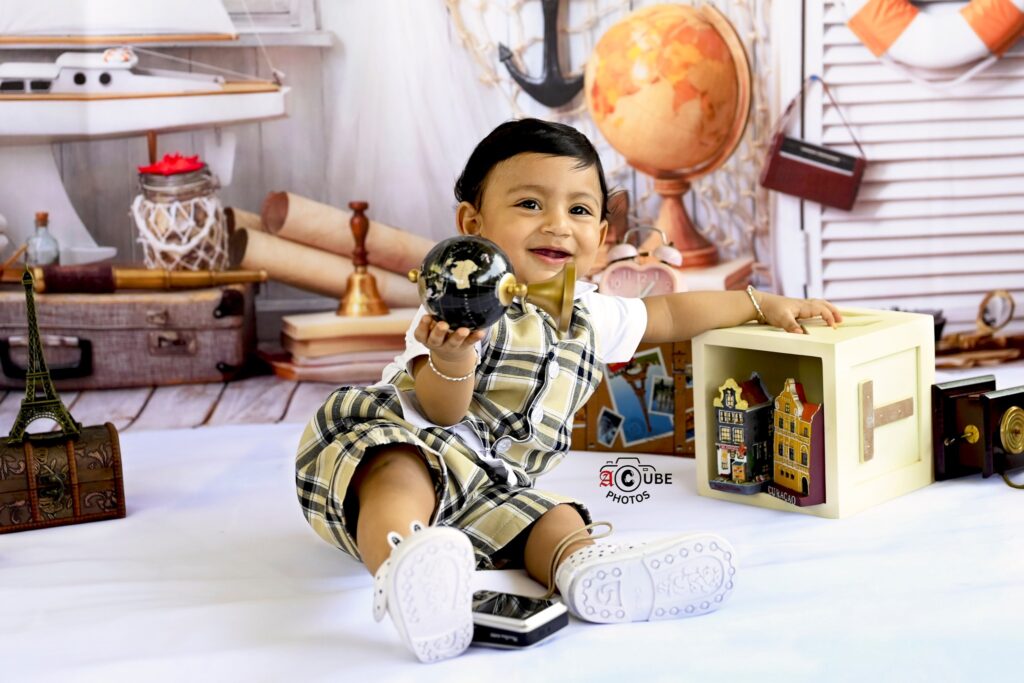 world explorer smiling baby