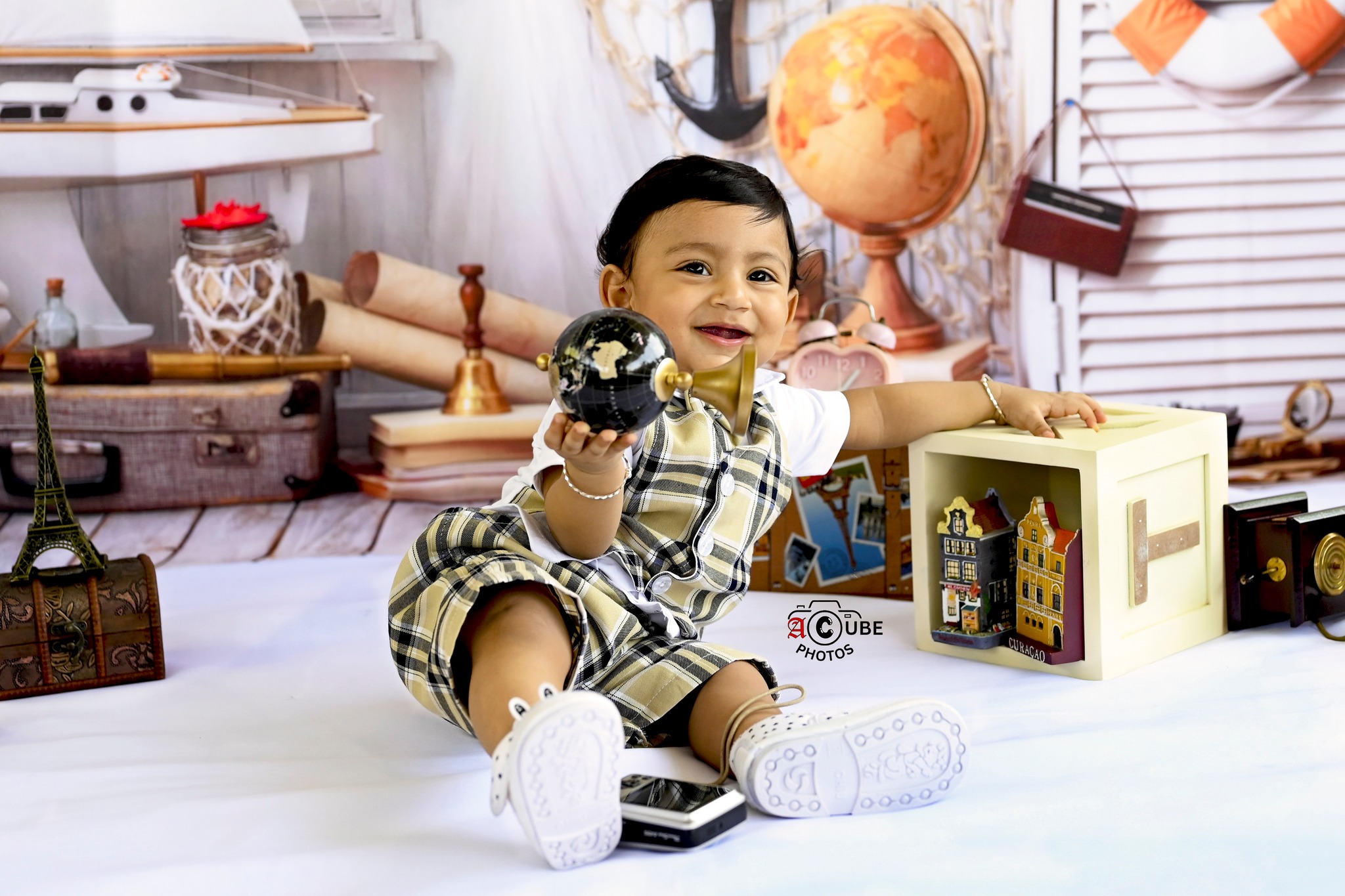 world explorer smiling baby