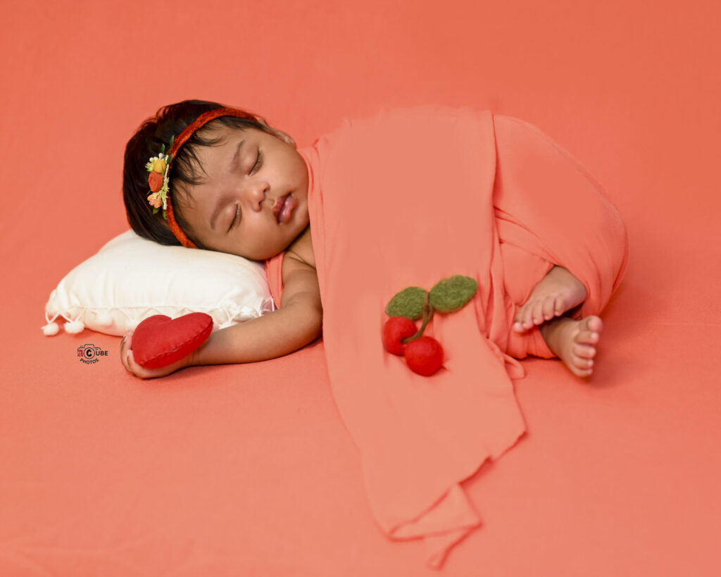 Newborn in Coral Wrap