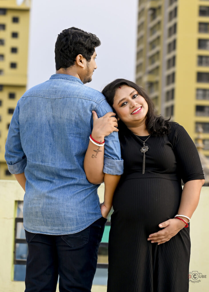 Cute couple pose maternity