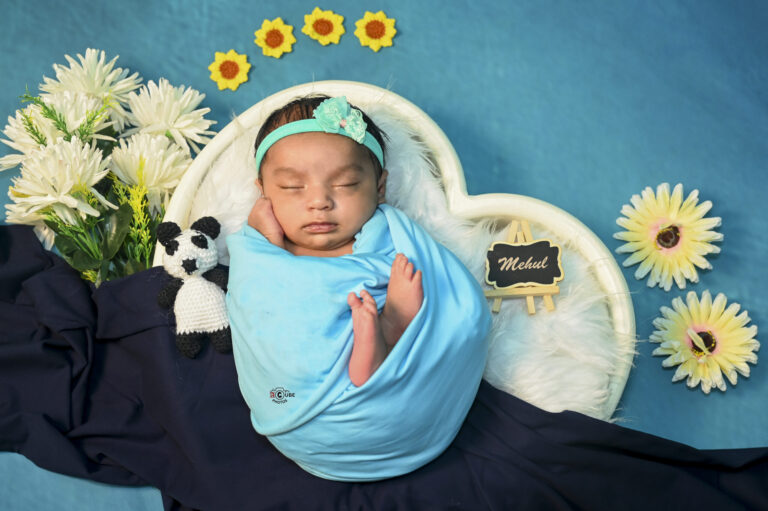 Newborn in Sky and Blue Wraps