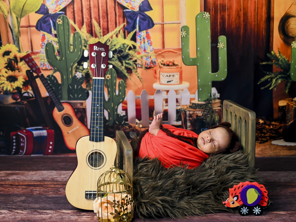 Newborn With Guitar