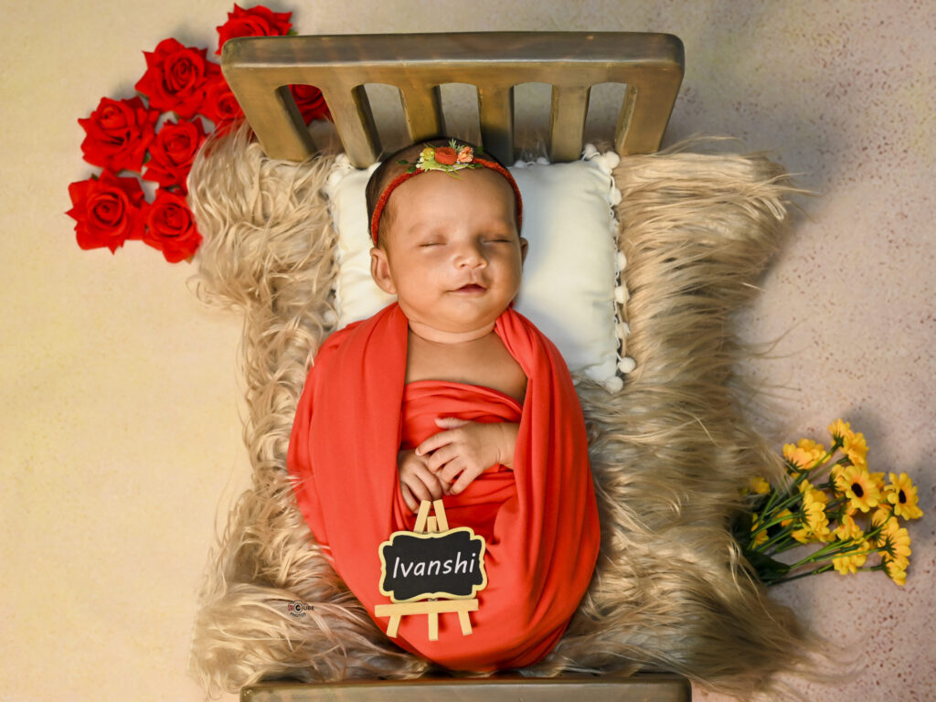 Newborn Girl in Red Dress