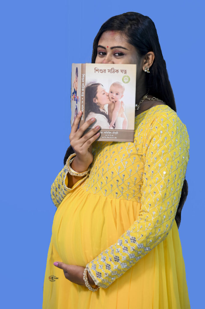 Maternity photo with book