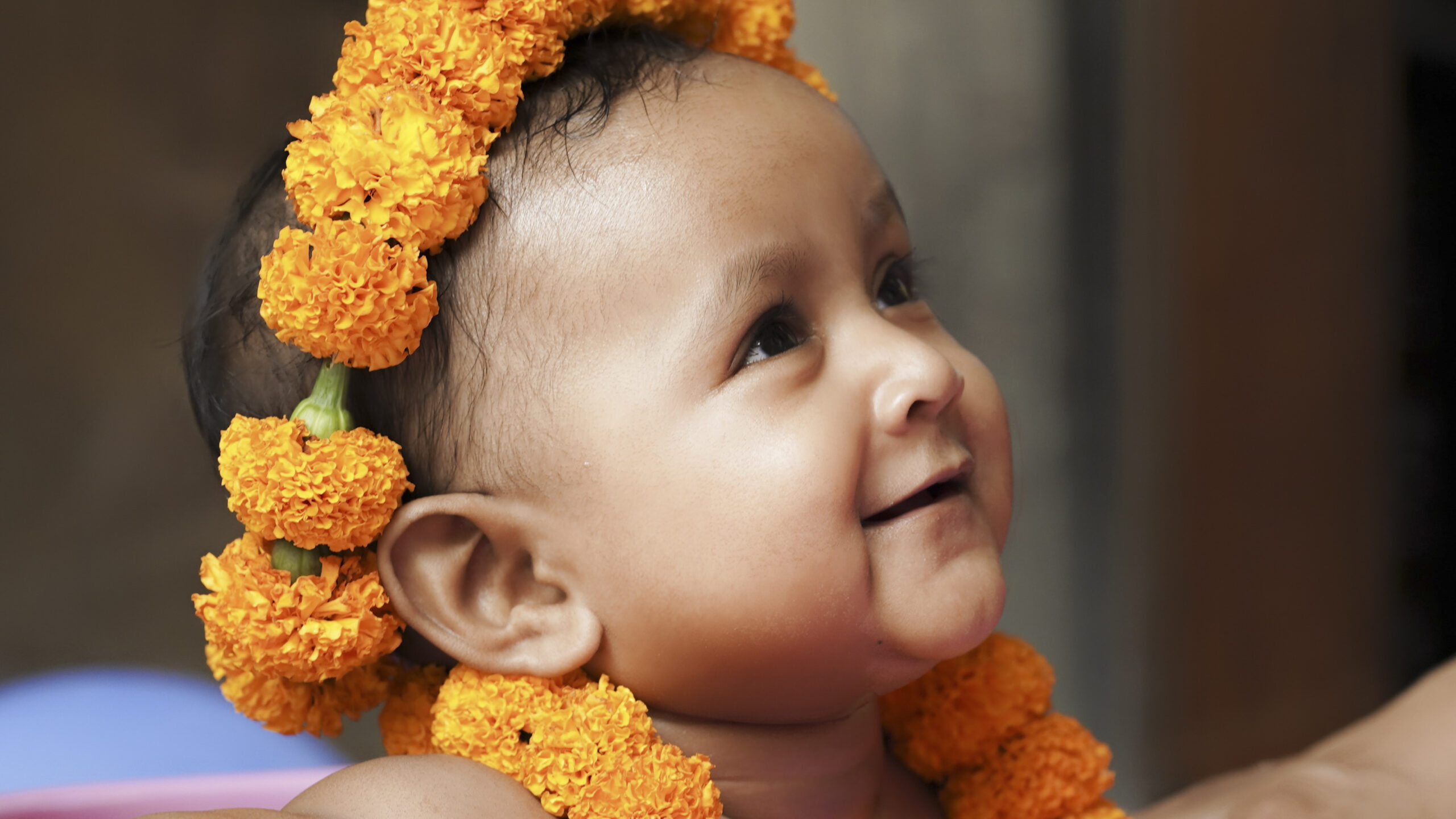 smiling baby rice ceremony