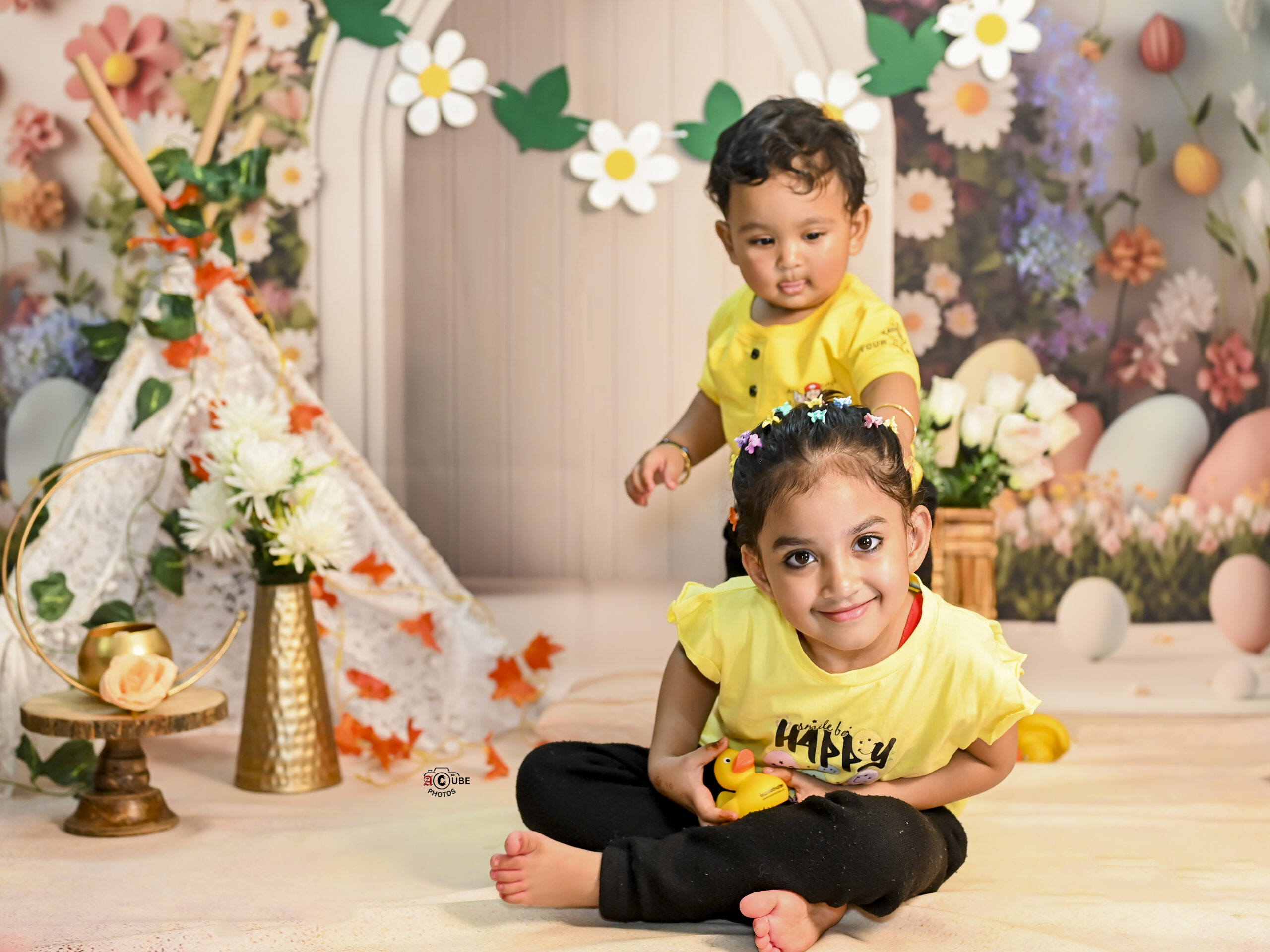 sibling photoshoot garden theme