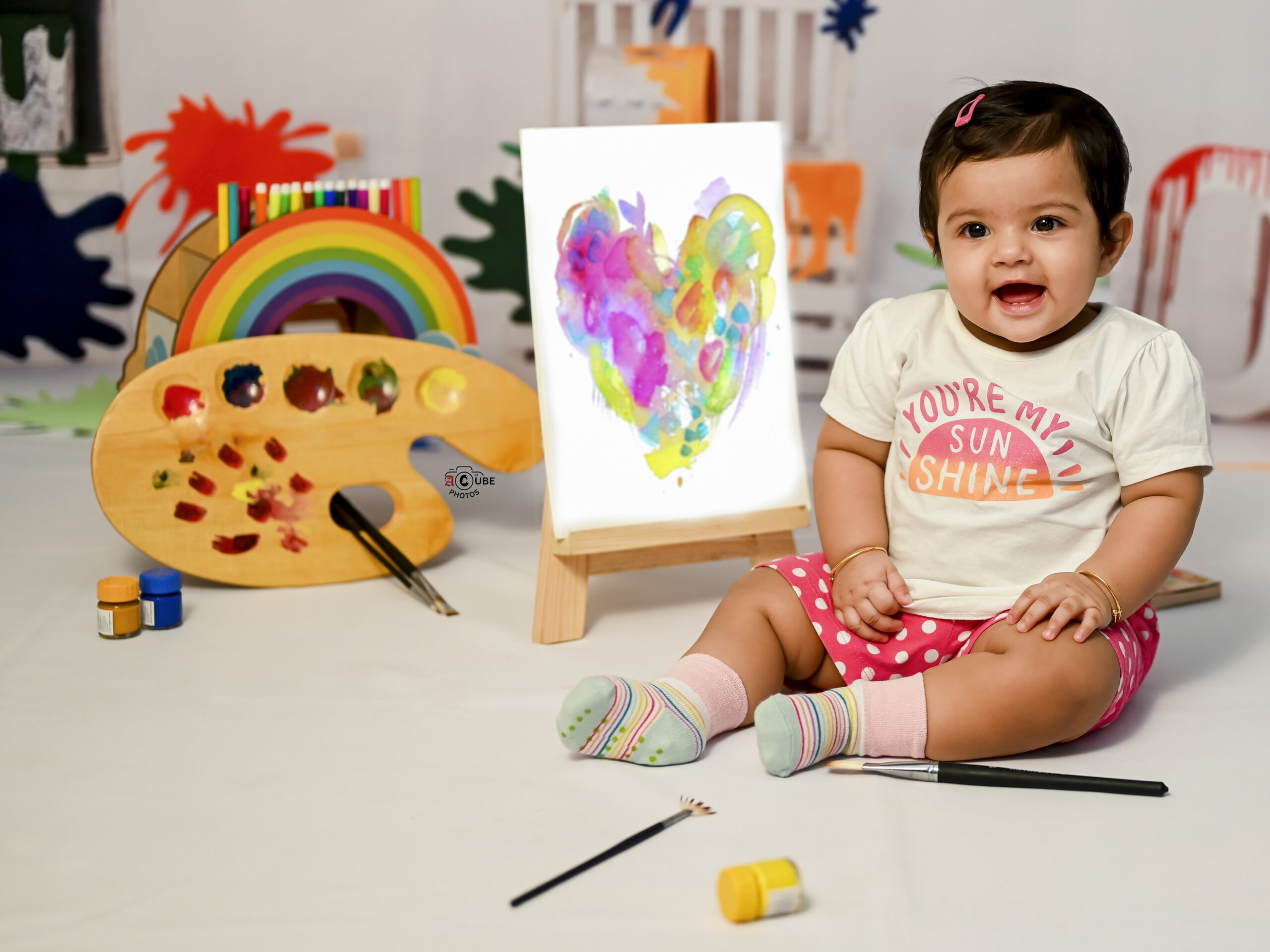 palette of joy baby girl smiling