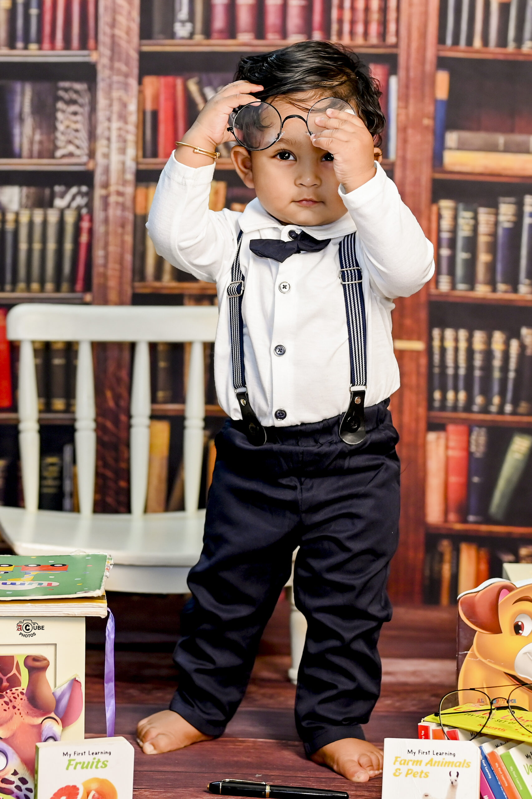 bookworm baby boy pose idea
